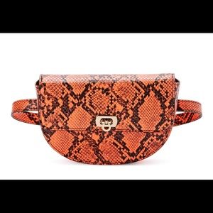 Scoop women’s coral faux snakeskin belt bag